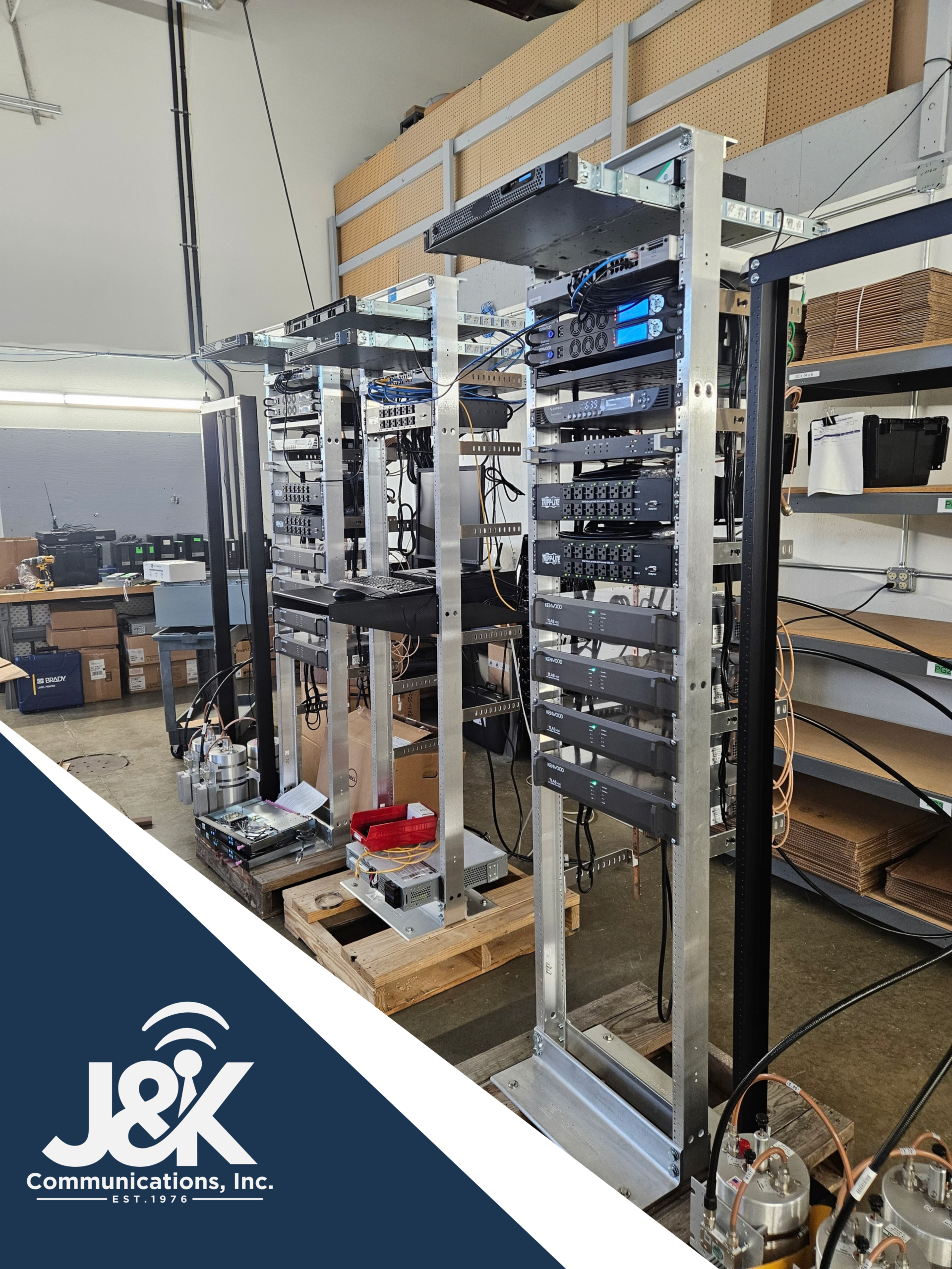 Atlas communications system racks staged with integrated equipment before deployment